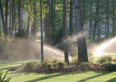 lawn sprinklers watering grass